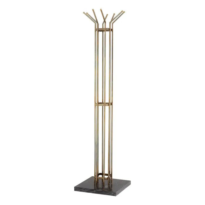 Volterra Coat Rack – elegant designer coat stand in brass finish, modern sculptural hallway furniture for luxury entryways, stylish freestanding coat hanger for contemporary interiors.