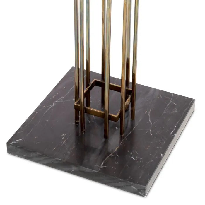 Volterra Coat Rack – elegant designer coat stand in brass finish, modern sculptural hallway furniture for luxury entryways, stylish freestanding coat hanger for contemporary interiors.