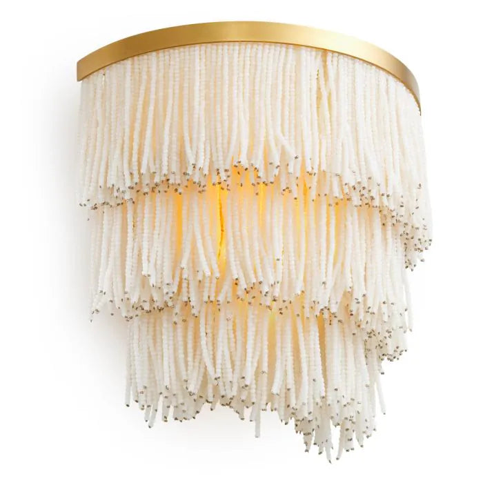 Eichholtz Wall Lamp Rosaline in vintage brass with three tiers of cascading white glass beads, luxury designer wall light