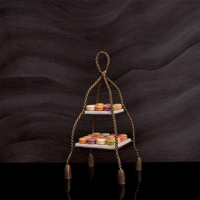 Eichholtz Cake Stand Vanelle with two white marble shelves, twisted vintage brass frame and decorative tassel-inspired feet
