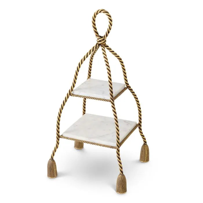 Eichholtz Cake Stand Vanelle with two white marble shelves, twisted vintage brass frame and decorative tassel-inspired feet