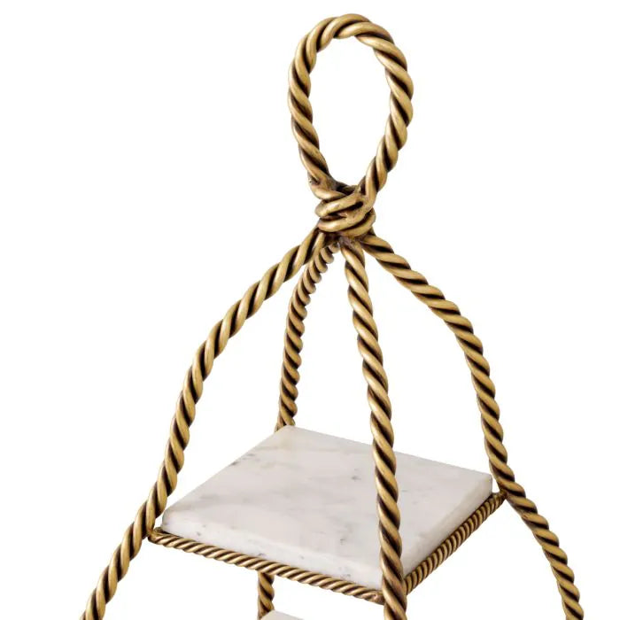 Eichholtz Cake Stand Vanelle with two white marble shelves, twisted vintage brass frame and decorative tassel-inspired feet