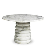 Eichholtz Coffee Table Lerici in natural white marble with a round top and sculptural stacked-disc pedestal base for luxury contemporary interiors.