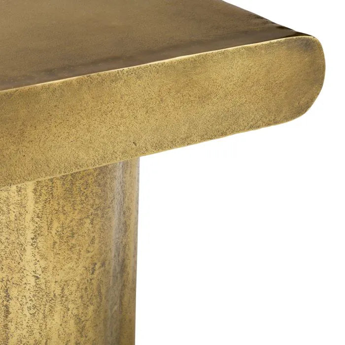 Eichholtz Coffee Table Bellington in textured vintage brass with organic curved top and sculptural cylindrical legs