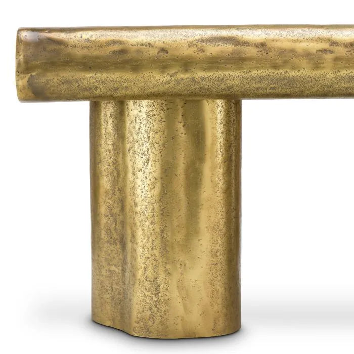 Eichholtz Coffee Table Bellington in textured vintage brass with organic curved top and sculptural cylindrical legs
