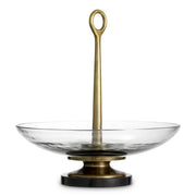 Eichholtz Bowl Opio in clear glass with vintage brass-finished stem and black granite base, luxury decorative centerpiece