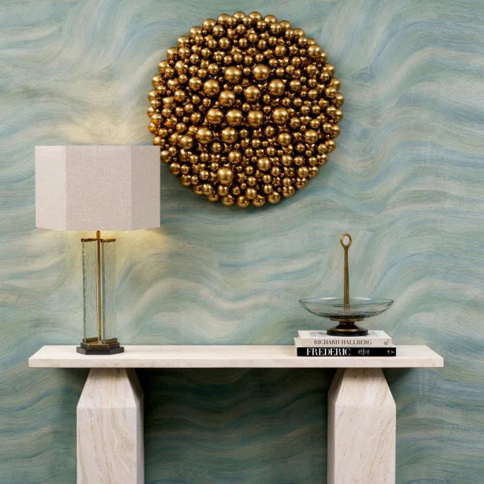 Eichholtz Bowl Opio in clear glass with vintage brass-finished stem and black granite base, luxury decorative centerpiece