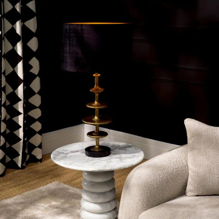 Eichholtz Table Lamp Rosetti with sculptural vintage brass stacked-disc stem, black granite base and large black fabric shade