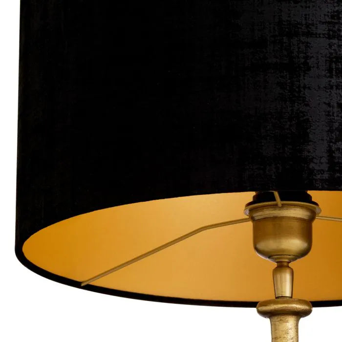 Eichholtz Table Lamp Rosetti with sculptural vintage brass stacked-disc stem, black granite base and large black fabric shade
