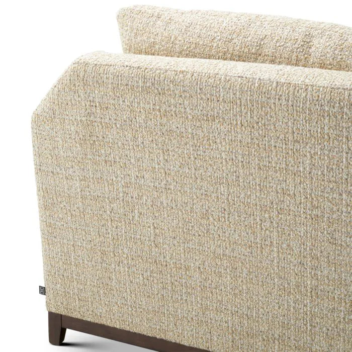 Eichholtz Sofa Vestry three-seater upholstered in beige Winslow chenille with curved arms, deep cushions and mahogany-finish base