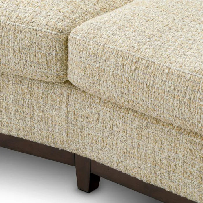 Eichholtz Sofa Vestry three-seater upholstered in beige Winslow chenille with curved arms, deep cushions and mahogany-finish base