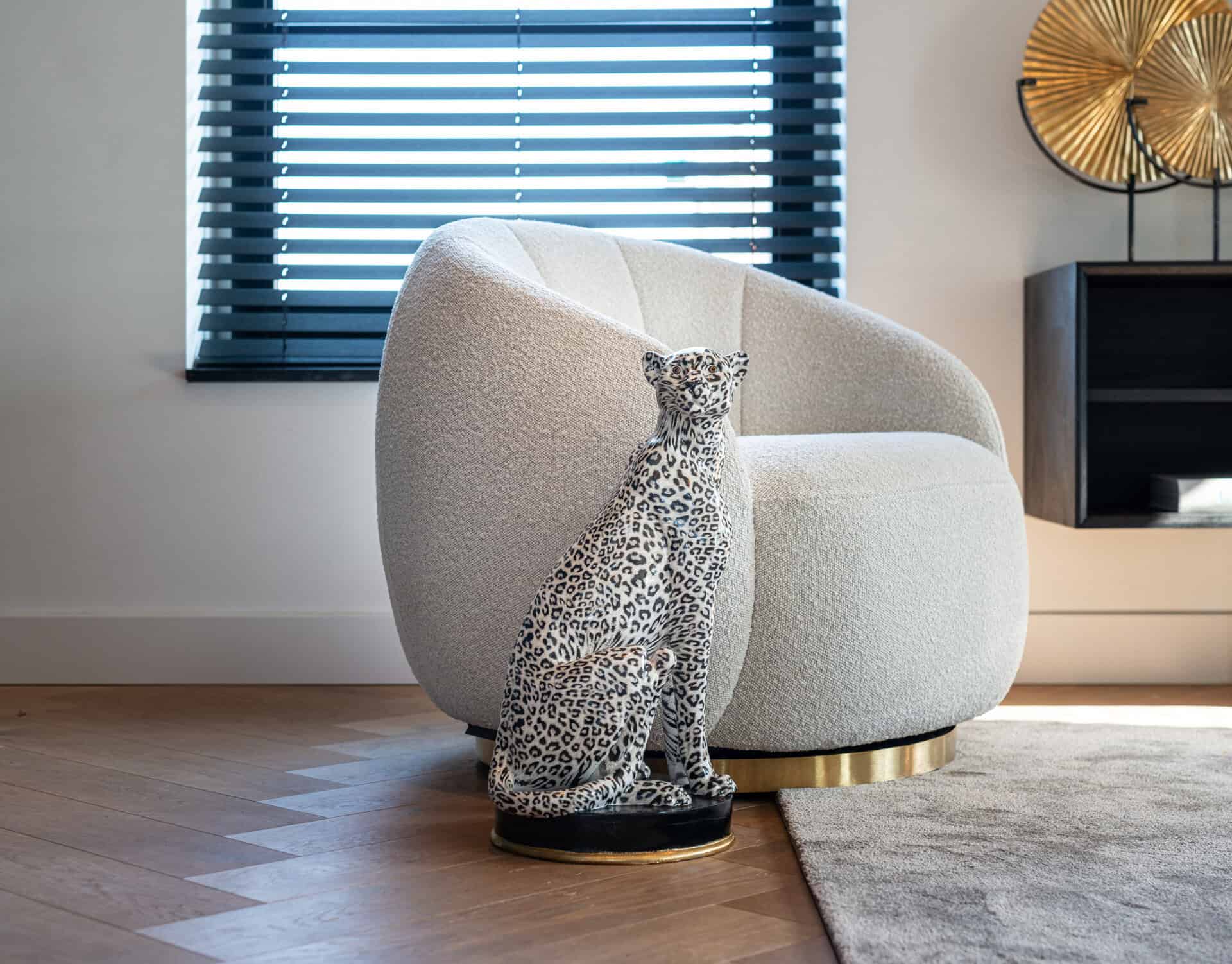 Armchair in white fabric by Richmond Interiors 